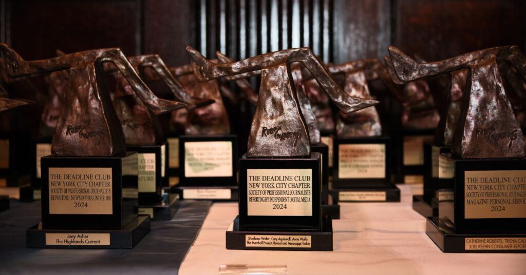 Photograph of Rube statuettes.