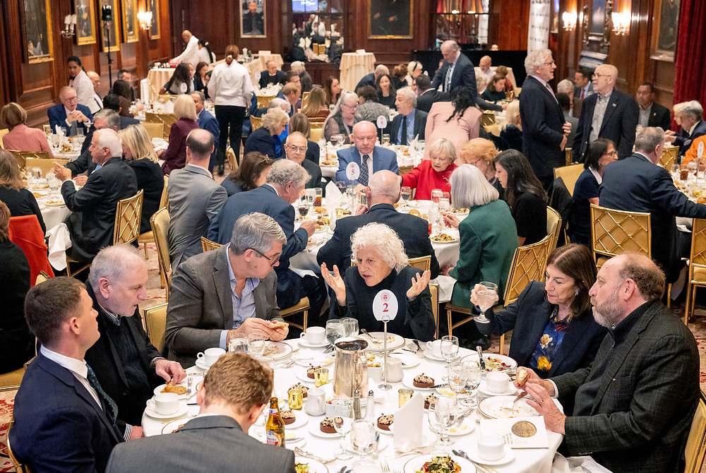 The crowd inside the Harvard Club.